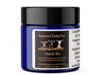 Udderly Blis goat milk CBD and magnesium cream in a cobalt blue glass jar with black lid, 1,100 mg CBD isolate per oz, handmade by Goat Milk Blis